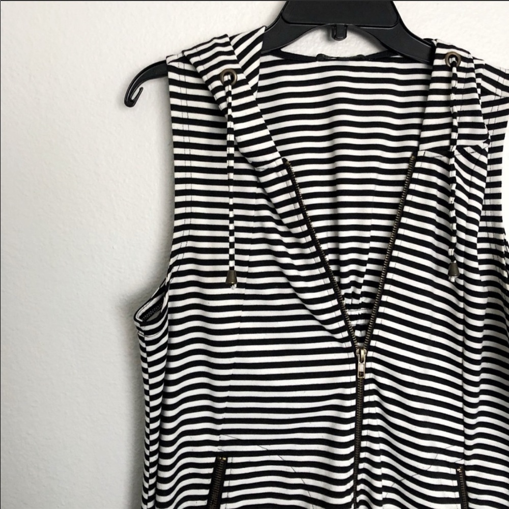 Black and white striped hooded sleeveless vest